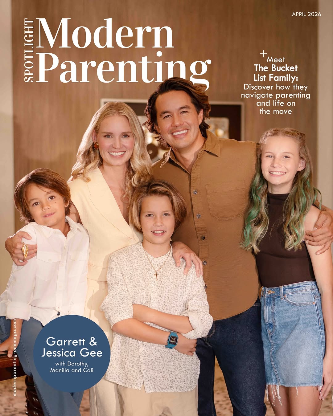 Family of five posing for a magazine cover portrait, smiling indoors for Modern Parenting.